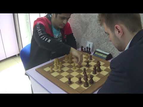 Knight sacrifice for boxing the king: GM Bajarani - GM Meshkovs, Nimzo-Indian defense