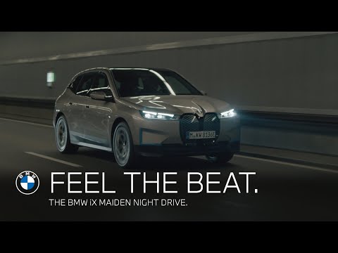 Feel the beat. The BMW iX maiden voyage through the night.