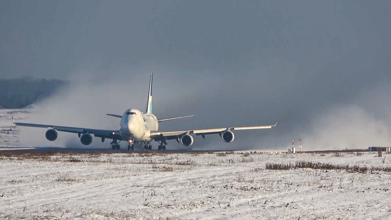 BOEING 747 CREATES A SNOWSTORM during DEPARTURE - B747s in the Snow (4K)
