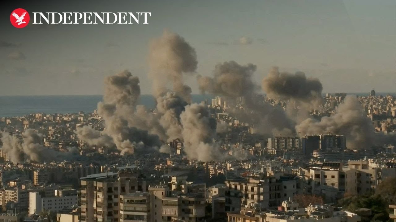 Huge smoke clouds rise above Beirut as fresh wave of strikes leave three dead