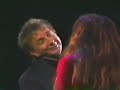 Barry Manilow and Donna Summer performing the song Could it Be Magic