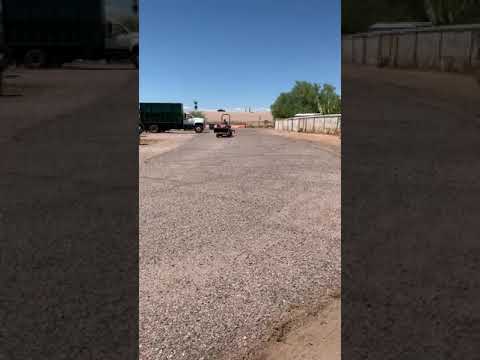 My 11-year-old stepson operating a tractor