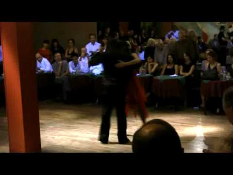  Diego Riemer  and  Maria Belen Giachello  are  dancing  to  a  milonga