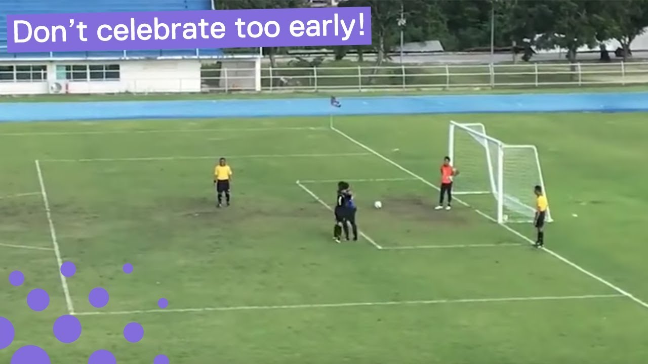 BALL BOUNCES INTO NET WHILE GOALKEEPER CELEBRATES PENALTY 'MISS' - YouTube