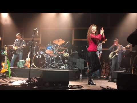 Mags McCarthy doing trade-offs of her signature high speed tap with drummer at showcase.