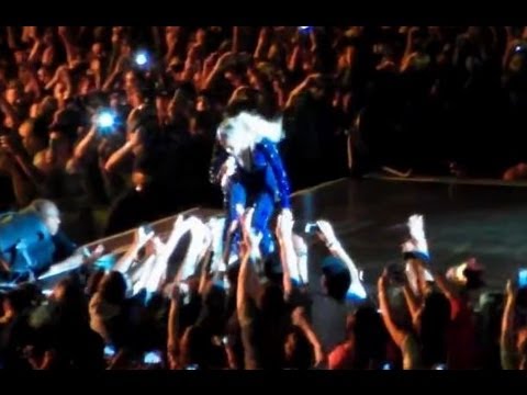 BEYONCE PULLED OFF STAGE BY FAN AT CONCERT IN BRAZIL