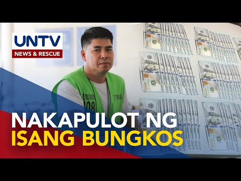 NAIA staff na nagsauli ng napulot na bungkos ng dolyares, umani ng paghanga