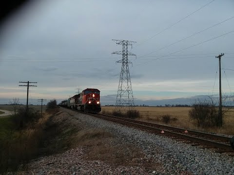 CN 5660 and BCOL 4611(BC Rail Paint C40-8M) Lead U706 with an Awesome horn