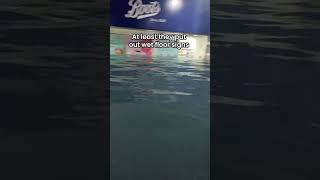 Wet floor signs in the flood