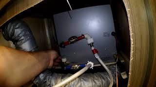 Adjusting tankless hot water heater in RV Thor Motorcoach
