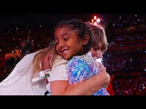bianka bryant getting the 22 hat from Taylor swift Concert at the eras tour 💗🦋