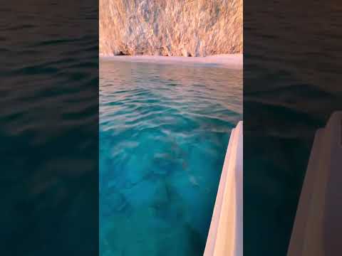 Watch as a golden sun sets over the blue waters of Zakynthos💖#trending #viral #reels #video #shorts