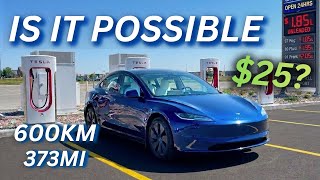 Tesla Model 3 at a Saskatchewan Supercharger in wind and rain