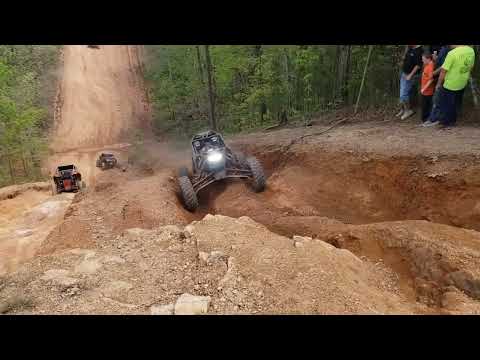 Tube RZR climbing the left side of the pwerlines at Indian Mountain ATV Park