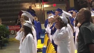 Sister in tears after her Airman brother surprises her at graduation