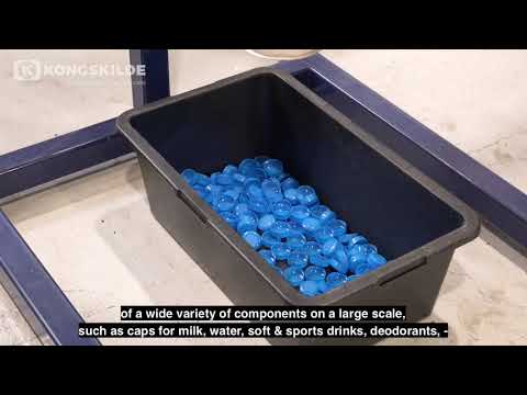 Transport pneumatique de pièces moulées par injection