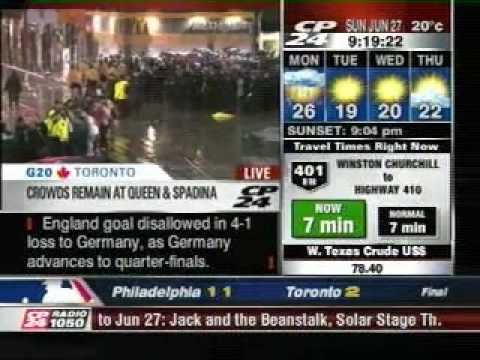 G20 Queen Spadina small crowd held captive in torrential rain June 27 2010 - part 1