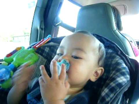 baby watching his twin brothers eat ice cream