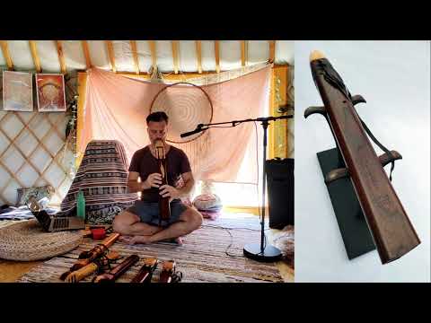 7 Hole Drone Flute in the Key of Low D - of Walnut and Maple carved Feather and accents 440Hz