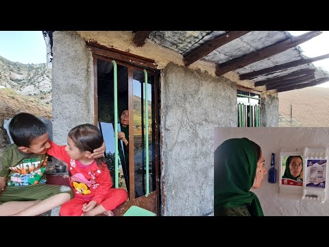 Afsaneh installing glass: and decorating the house and bathing her children