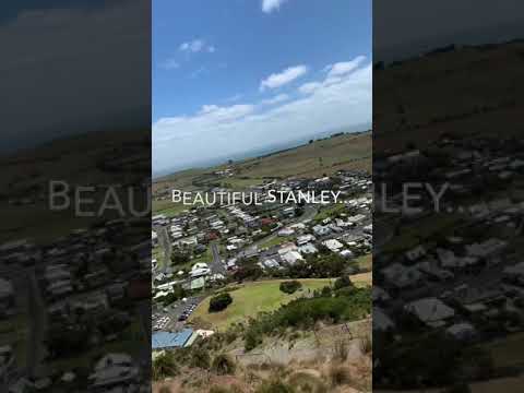 Beautiful Stanley Beach from the top of the mountain and electric chairs