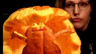 CARVING THE ELMO IN FIRE MEME ON A PUMPKIN