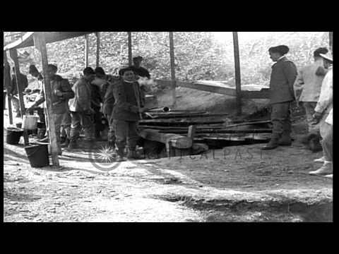 Italian troops set up a field kitchen on the Isonzo front during World War I HD Stock Footage
