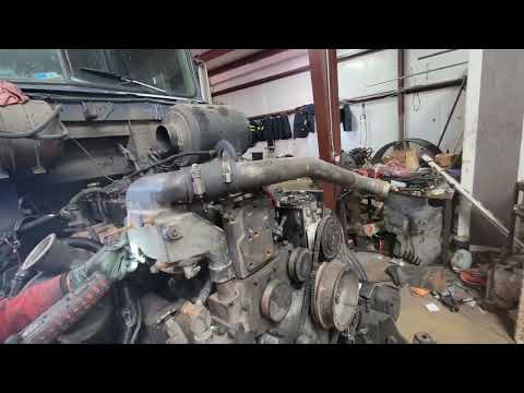How to Install Thermostat Housing on a N14 Cummins Engine! Sure Repair Diesal & Towing! Marion, AR