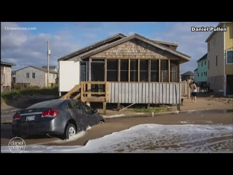 Coastal flooding washing over Outer Banks