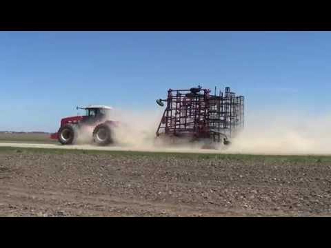 A Versatile 535 Tractor rolling down an Iowa road.