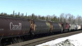 preview picture of video 'CP grain hoppers heading south on CN tracks at Ardbeg on March 20 2009'