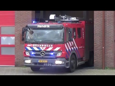brandweer tankautospuit Hendrik met spoed naar en brandmelding in Amsterdam