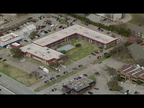 Heavy police presence at a Red Roof Inn in North Texas