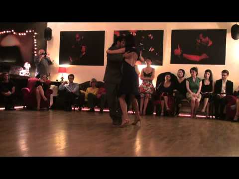  Adrian Costa  and  Amanda Costa  are  dancing  to  the  tango  "  Carillon De La Merced  "