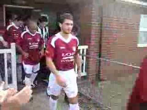 Dereham Town team coming out