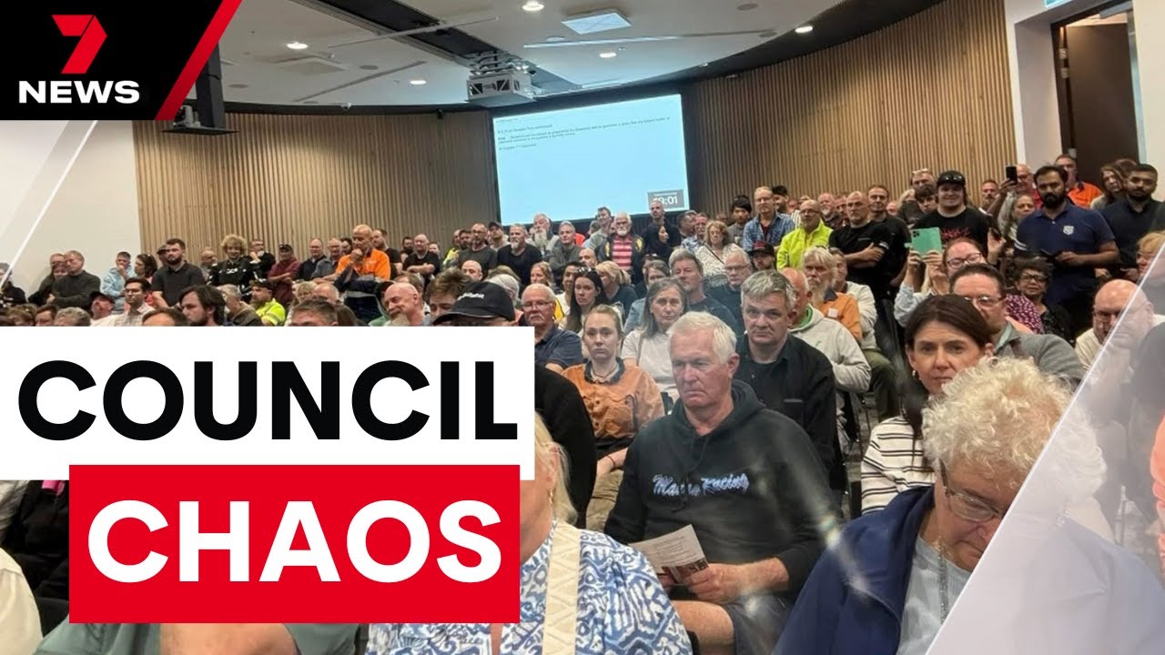 Council meeting shut down and police called in as residents vent their fury | 7NEWS