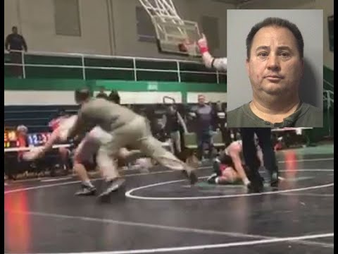 Dad Runs Onto Mat During High School Wrestling Match & Takes Down Opponent