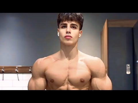 Handsome young man flexing muscles |Biceps|