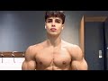 Handsome Young Man Flexing Muscles Biceps