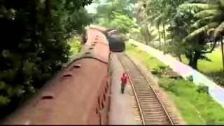 preview picture of video 'A Guy risk his life with Two trains and Nearly killed him slef'
