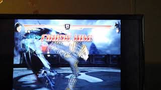 How to do a fatality on Mortal Kombat versus DC Universe on PlayStation 3