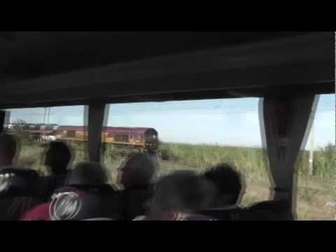 A brief scene of Class 66 66222 seen from tourist coach heading towards Sete France 20/10/2011