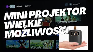 Kompaktowy projektor DLP ETOE Dolphin z Google TV,  wbudowaną baterią i jasnością 500 ANSI Lumenów