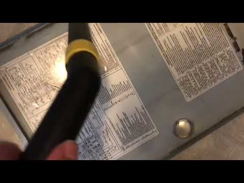 Vacuuming up 20 years of dust out of furnace
