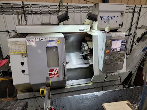 Haas SL-20 CNC Turning Center w/ Tool Presetter, Auto Door, LMC 3-Jaw 8" Chuck, Chip Conveyor & More