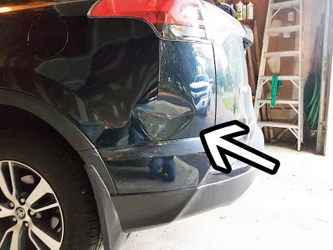 Large Dent Removed from Rav4 with  Paintless Dent Removal