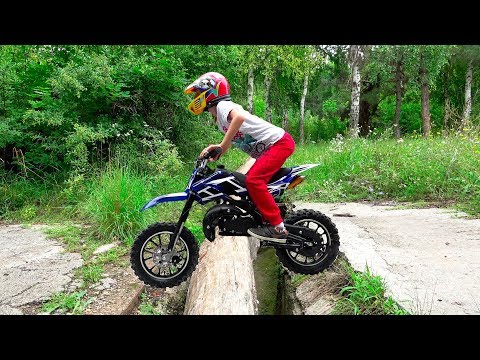Little Boy Rides on Power Wheels Dirt Bike, Test Drive for Kids