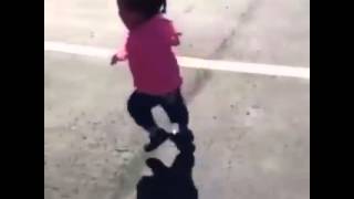 Little girl afraid of her shadow