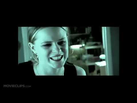 Official trailer frame of Thirteen (2003): Tracy and Evie sprint down Melrose, music pulsing like a dare