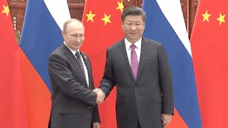 Xi Meets Putin, Calling for Firm Mutual Support